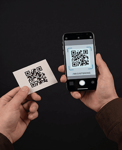 Scanning the QR code on a Proof Product hang tag with the Fishtechy app